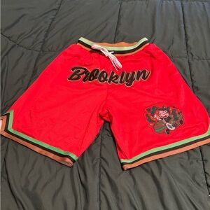 Men’s NWOT Red Athletic Shorts with Brooklyn and Striped Trim.